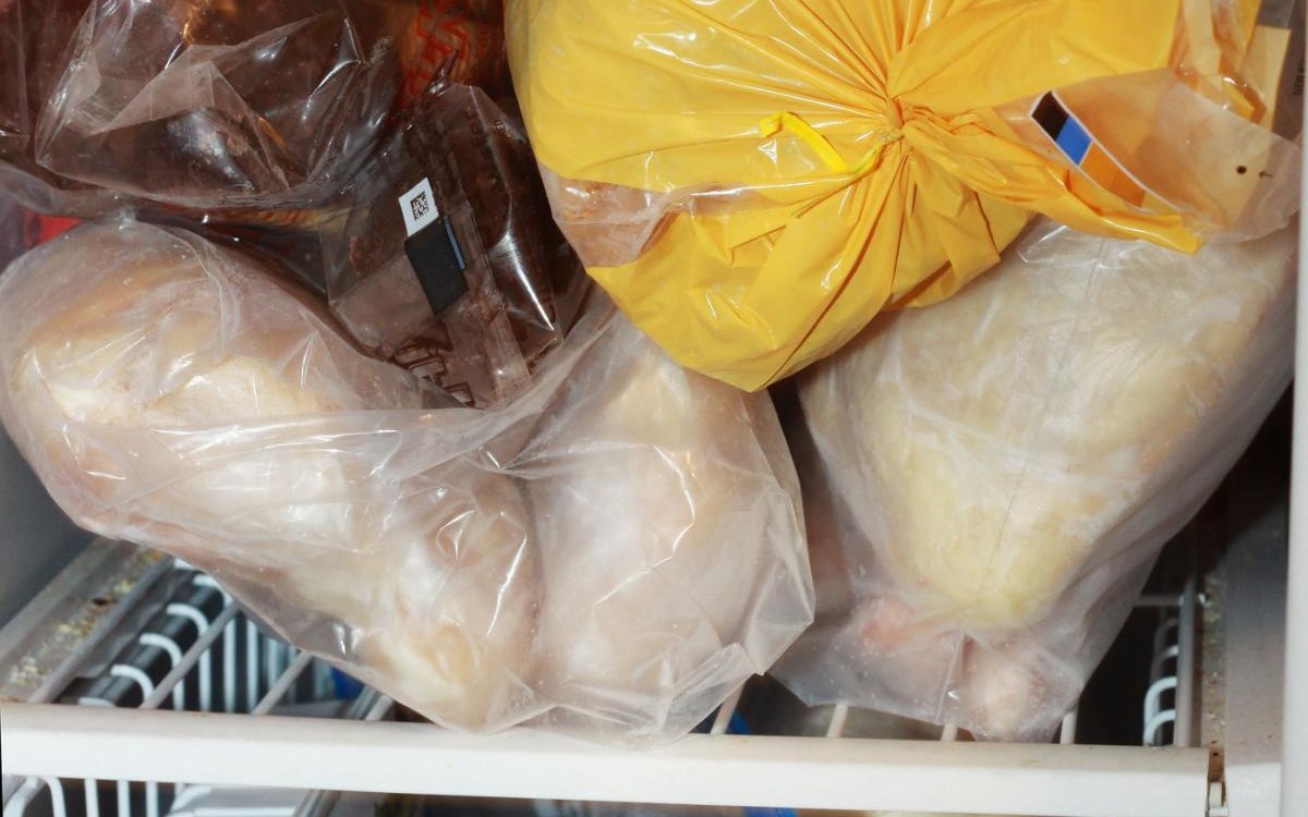Common freezer storage product mistakes example with cold-storage bins and food containers