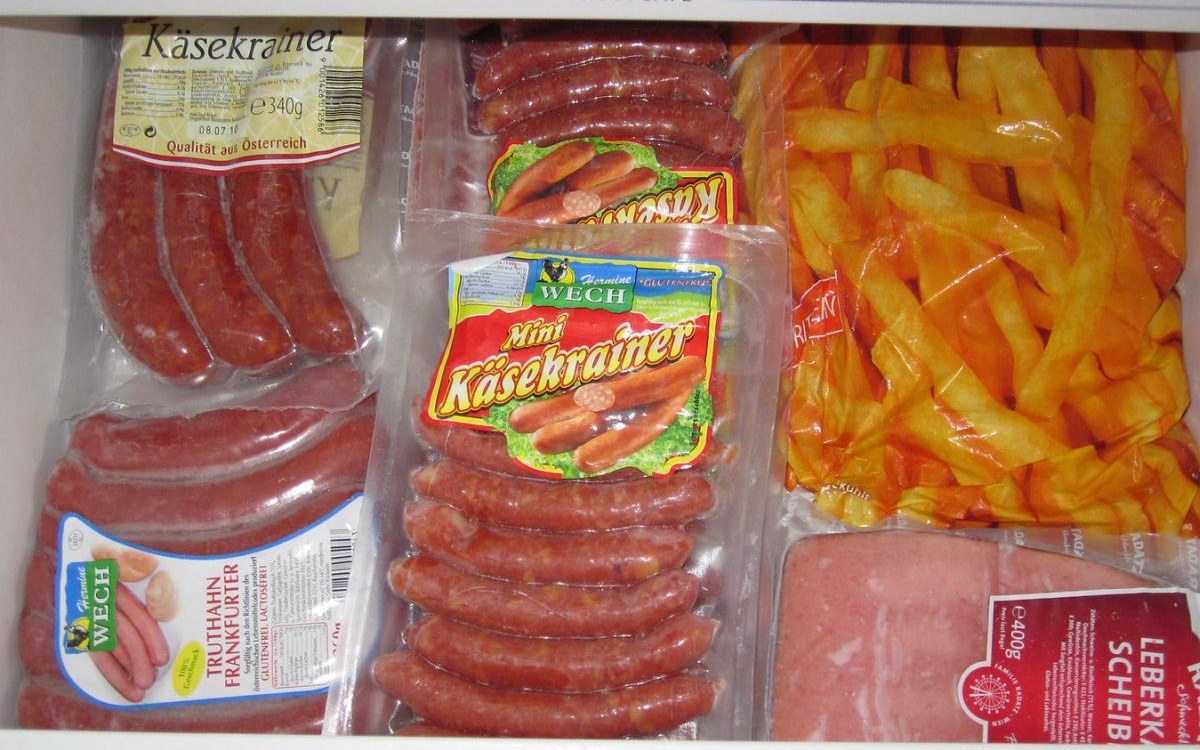 Small freezer organization guide for apartments example with cold-storage bins and food containers